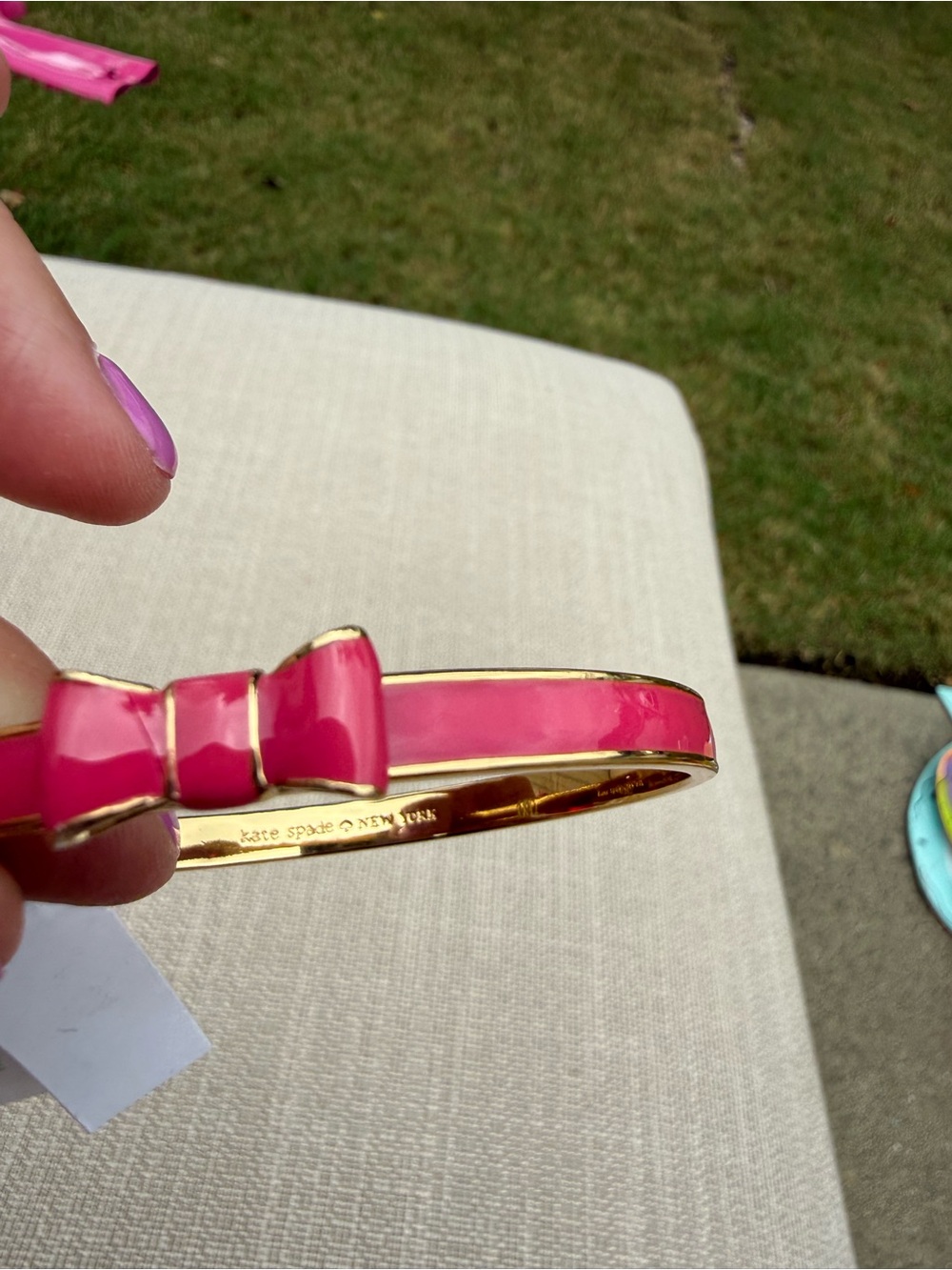 Kate Spade Gold-Tone Bracelet with Pink Enamel Bow Accent - Picture 4 of 4